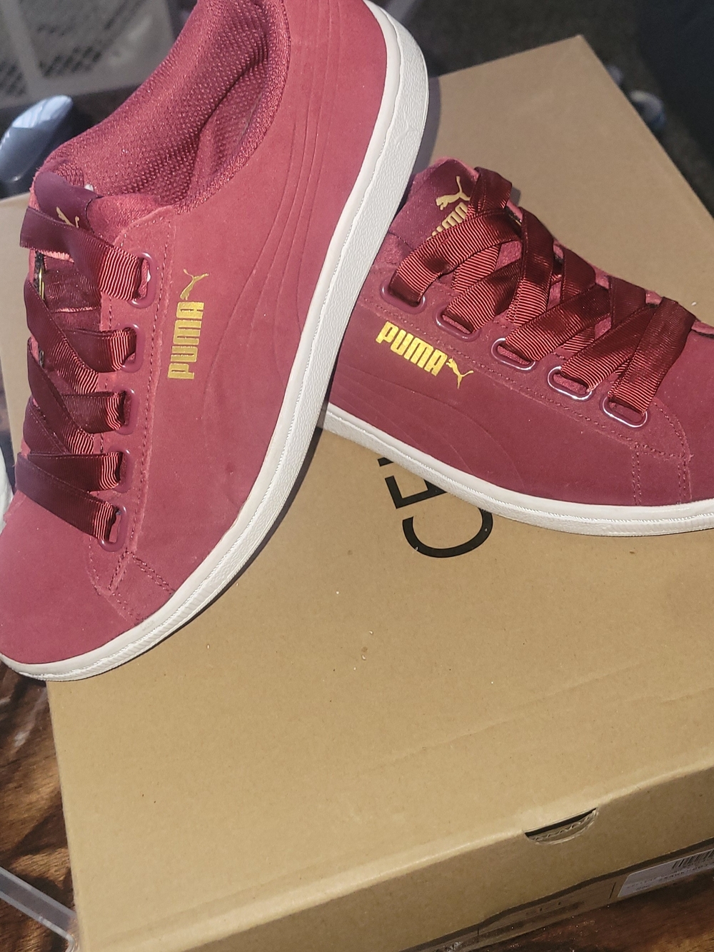 Puma Women's Burgundy Suede Low-Top Sneakers with Gold Logo